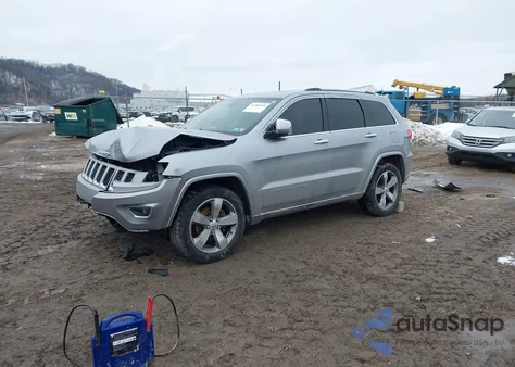 2014 Jeep Grand Cherokee Overland z USA, uszkodzony, nr VIN 1C4RJFCG6EC402398